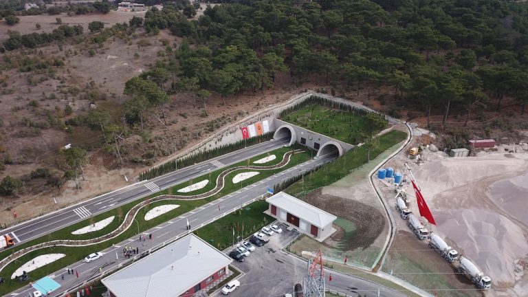Aerial shot of a tunnel entrance surrounded by greenery in Yeniçam, Turkey. — Why weight loss needs a medical foundation